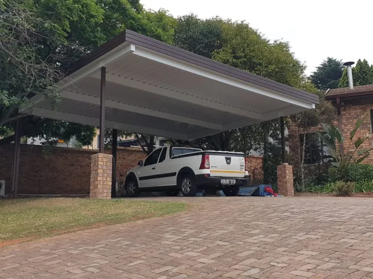 Aluminium carport with hidden box-gutter system installed at a Johannesburg home