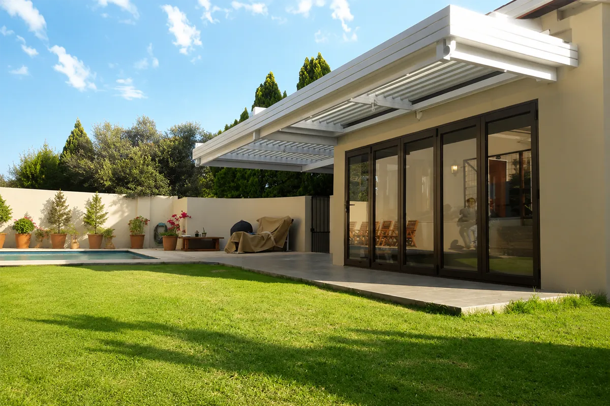 Completed adjustable louvre awning over a custom outdoor living space