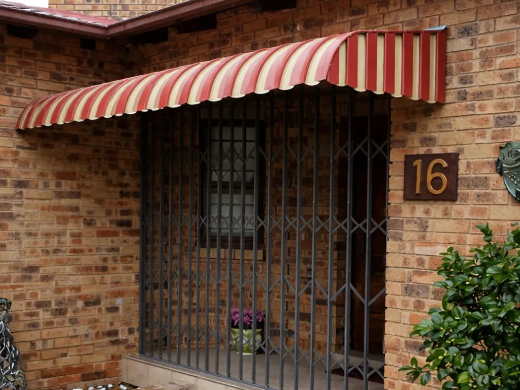 Fixed profile awning installed over a window